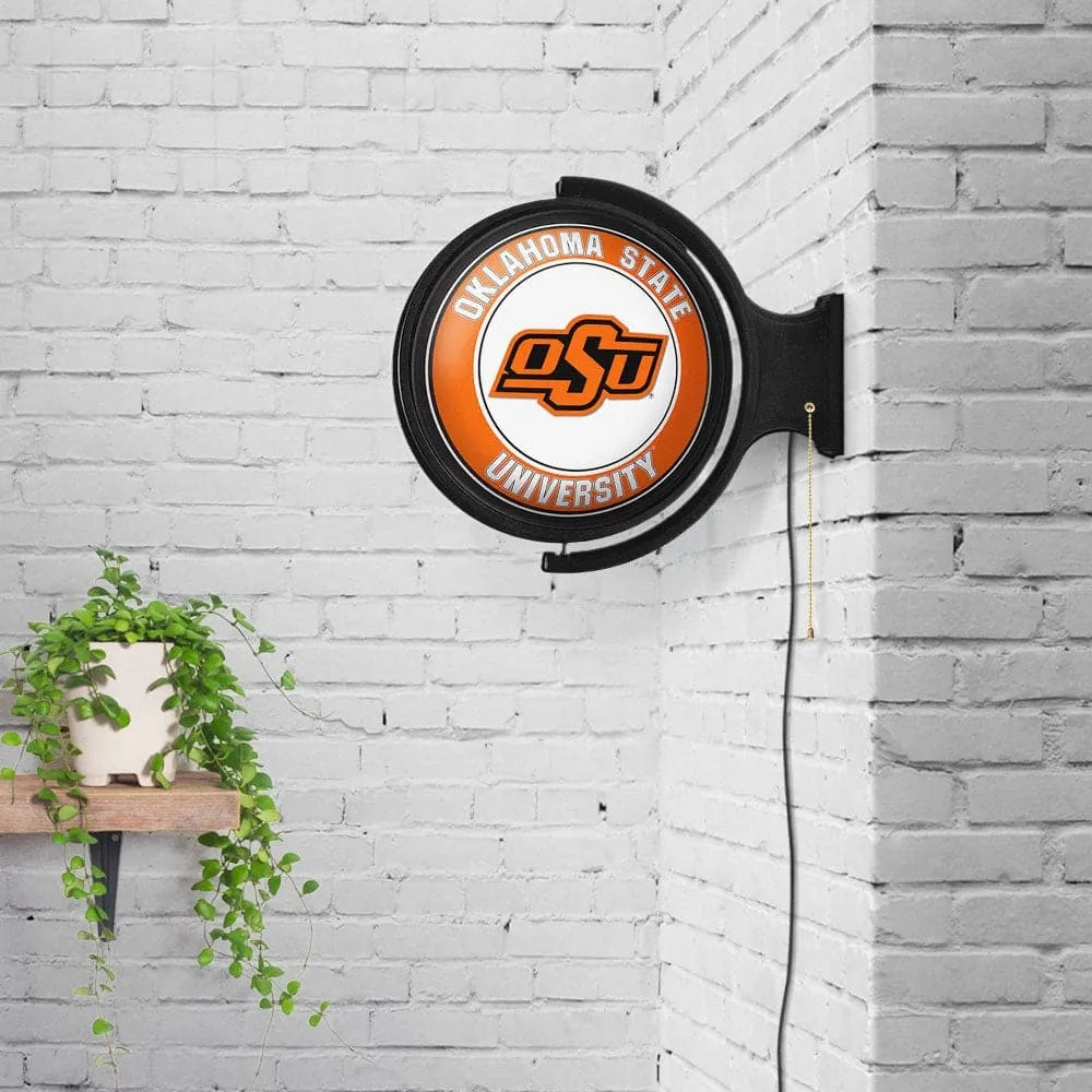Oklahoma State Cowboys: Original Round Rotating Lighted Wall Sign
