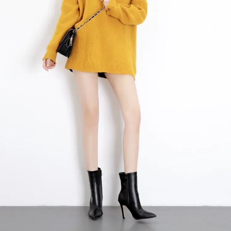 Stiletto heeled Martin boots