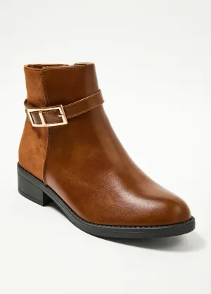Two-material boots with heel and buckle
