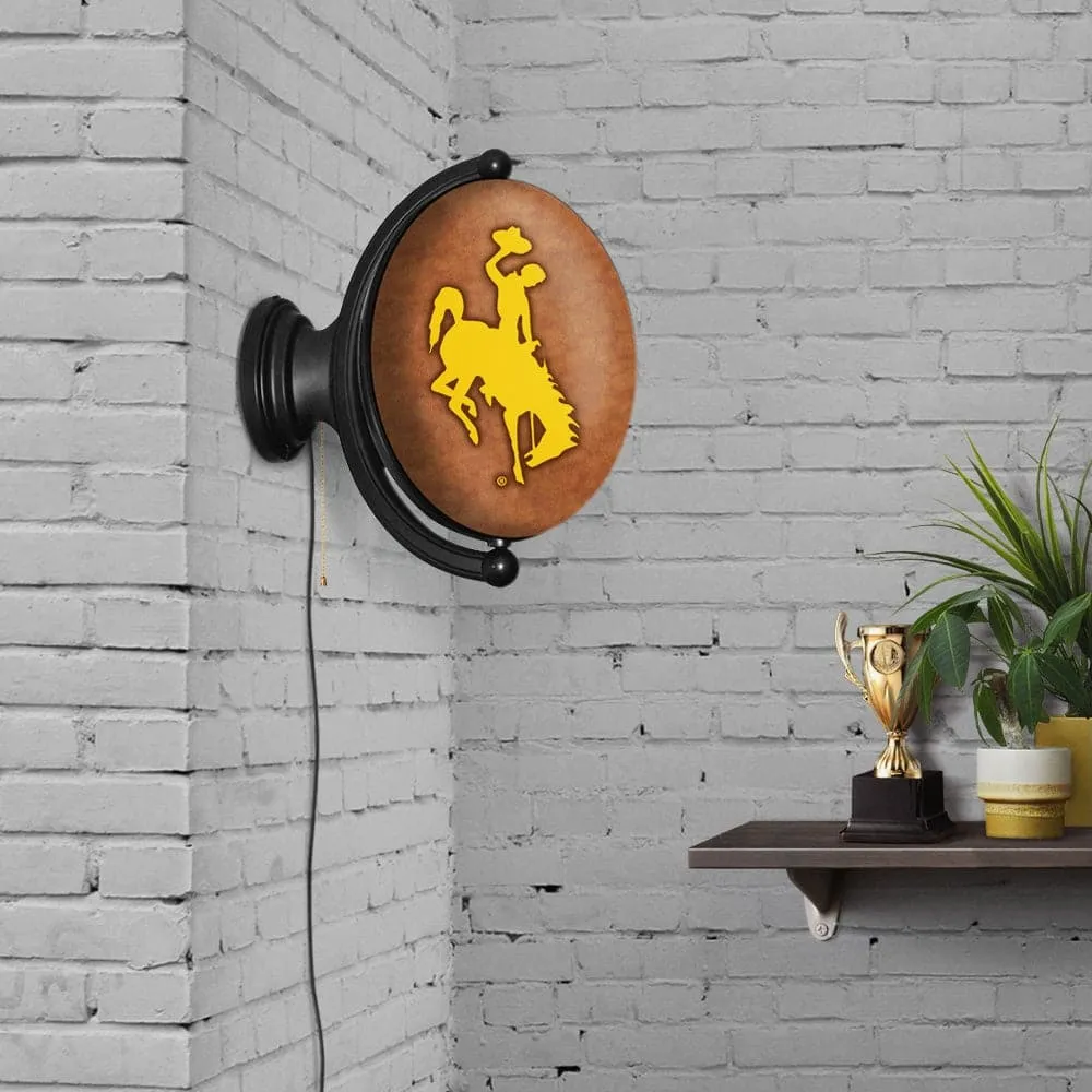 Wyoming Cowboys: Leather - Original Oval Rotating Lighted Wall Sign